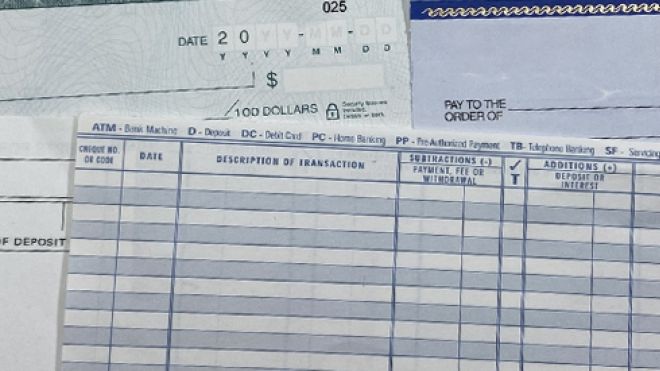 checkbook and a variety of checks