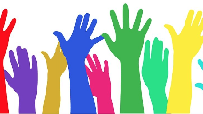 Illustration of raised hands in a rainbow of colours
