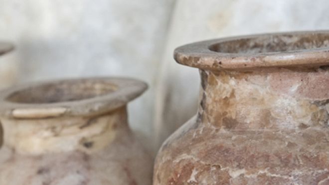 A series of clay urns or vased