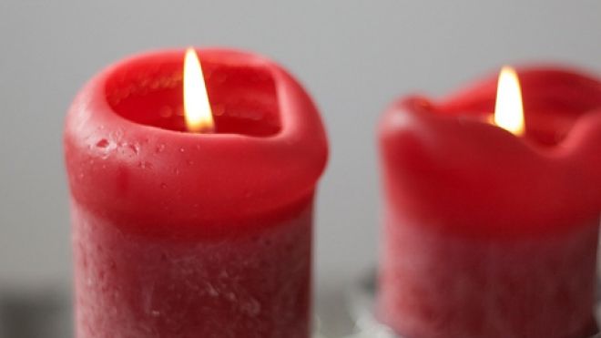 four red lit candles