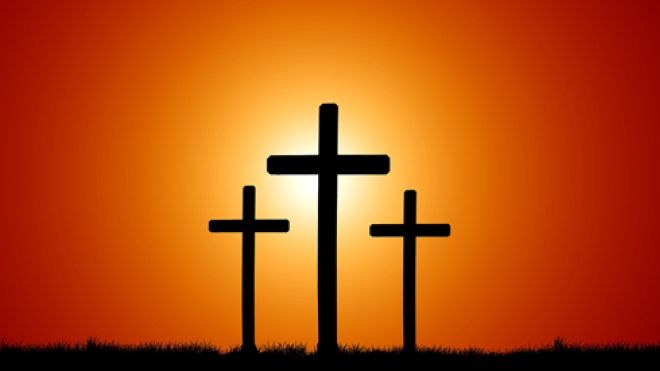 Three crossed on a deep orange sunlit background