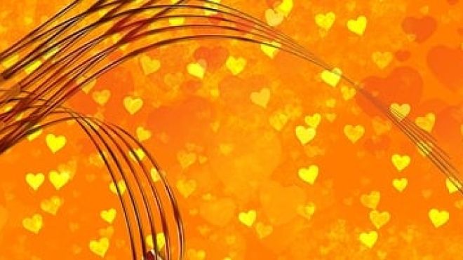 music staff with hearts on orange background