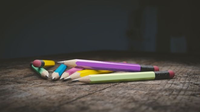 colourul pencils on a wooden table