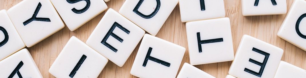 Scattered Tiles with Letters