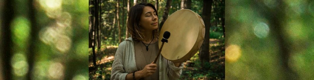 Indigenous woman drumming