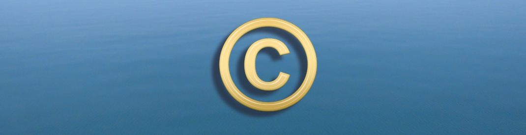 gold copyright symbol on blue background