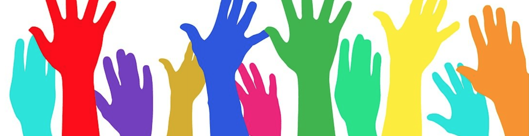 Illustration of raised hands in a rainbow of colours