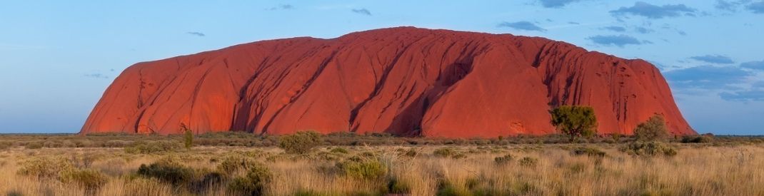 Uluru in Australia Uluru in Australia, red desert landscape in a blue sky