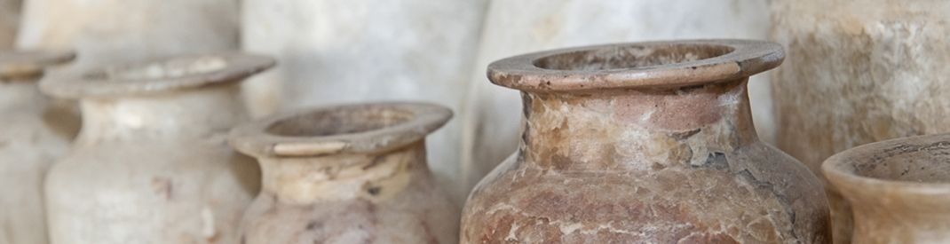 A series of clay urns or vased