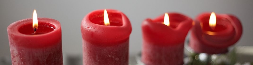 four red lit candles four red lit candles