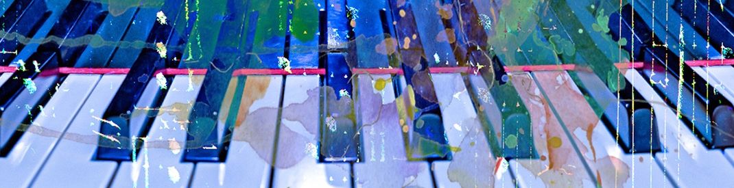 The Art of Improvisation keyboard keys with watercolor paintwash overlay