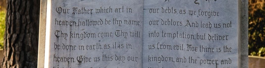 An old stone bible open