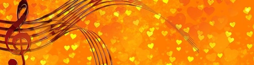 music staff with hearts music staff with hearts on orange background