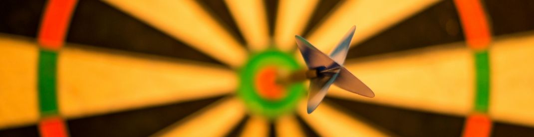 bullseye dart on a dartboard